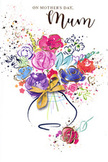 This Mother's Day card showcases a lively, artistic bouquet that seems to dance across the page, echoing the easy, village-like charm of Queen's Park itself. Strong indigo strokes trace petals, buds, and stems, giving movement and rhythm to juicy splashes of cerise, magenta, and rosy pink that dominate the centre of the design. These brighter flowers are tempered by calmer touches of lavender, dusky purple, and sky blue, which seep gently into the paper and into one another, suggesting tenderness beneath the exuberance. Subtle veins of gold glimmer along certain petals and leaves, adding a refined sheen reminiscent of soft lamplight glowing through nearby terraced houses on a spring evening. The blooms are gathered into a rounded, stylised vase, indicated with minimal yet expressive lines that give it a friendly, familiar shape. A small golden bow rests at its base, evoking the moment a florist ties the final knot before a bouquet is handed over. Around the main cluster, scattered heart shapes and paint flecks drift outward, like confetti tossed in quiet celebration, conveying that love for Mum spills far beyond the arrangement itself. The white background keeps everything fresh and airy, ensuring that each colour and detail stands clear and bright. The card feels like a personal, painterly love note, ideally paired with a real bouquet from Queen's Park Florist and delivered to homes around the park, where it will stand as a long-lasting reminder of appreciation, tenderness, and shared family stories.